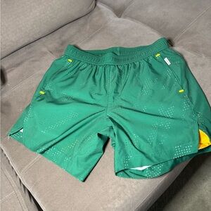 Women’s Green Athletic Running Shorts with Vent Panels